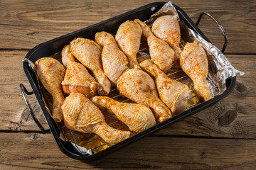 a roasting pan full of chicken thighs