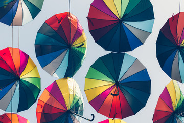 Colorful decorative umbrellas against the sky