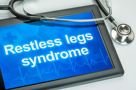 Tablet with the diagnosis Restless legs syndrome on the display