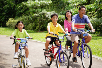 Family on bicycles, portrait