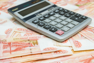 The calculator lies on big Russian money