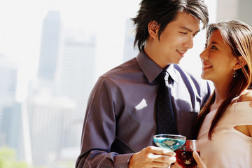 Couple looking at each other, portrait