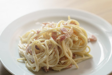 fresh homemade spaghetti carbonara with smoked bacon
