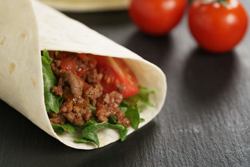 homemade tortilla with beef, frillice and vegetables