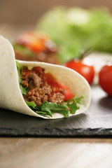 homemade tortilla with beef, frillice and vegetables