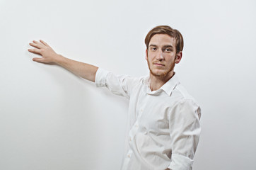 Young Adult Male Presenter in White Shirt Gesturing, Showing, Teaching