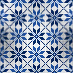 seamless knitted pattern with snowflakes in blue  - 126661363