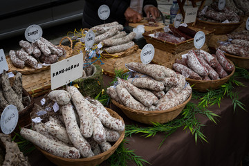 Dried suasage (saucisson = sausage)  on sale in the market of St Brieuc, Brittany, France