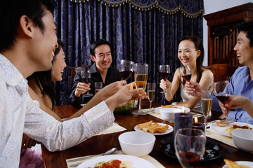 Adults at a dinner party