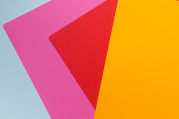 Obraz premium Paper, red, yellow, pink, blue, empty space