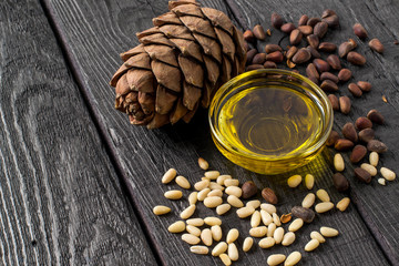 Nuts (seeds), cone and oil of Siberian pine
