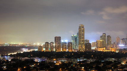 Fototapeta na wymiar Night view of Makati, the business district of Metro Manila, Philippines