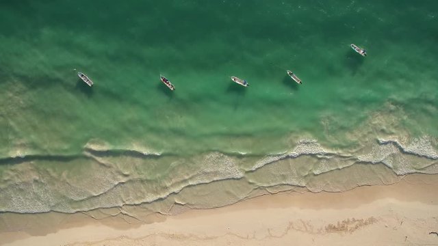 aerial view of beach and boats
