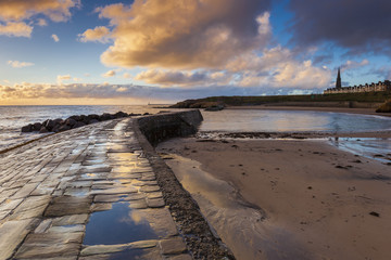 Dawn at Cullercoats Bay, North Tyneside, Engalnd, UK. From North Pier looking southward.