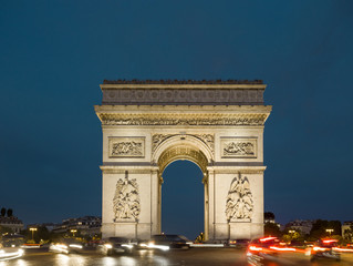 Fototapeta na wymiar Triumphal arch. Paris. France. View of Place Charles de Gaulle. Famous touristic architecture landmark in summer night. Napoleon victory monument. Symbol of french glory. World historical heritage.