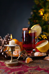 The mulled wine with spices and tangerines