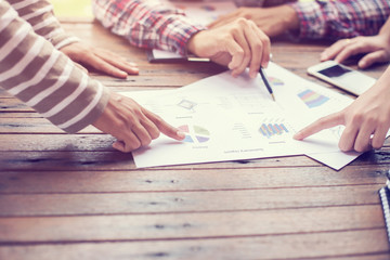 Business team working on laptop, while sitting at office. Busine