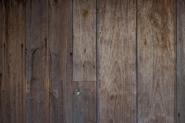 rustic weathered barn wood background with knots and nail holes