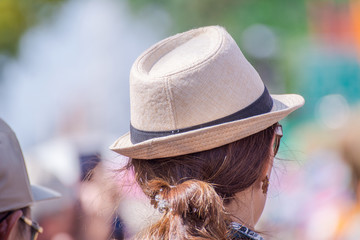 Summer travel style. Cropped shot of a beautiful girl wearing a hat fashion.