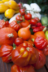 Wooden table full of vegetables