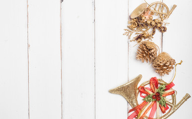 Decoration object ,star,ball color gold ,ribbon  christmas concept white wood background .top view
