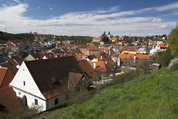 Fototapeta na wymiar Spring cityscape with rural buildings