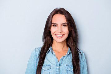 Portrait of pretty young brunette woman with beaming smile