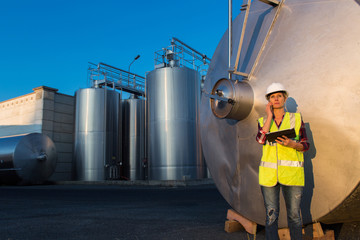 female engineer in contemporary winemaker factory