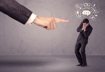 Boss hand pointing at confused employee