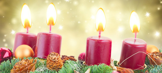 Evergreen fir tree advent garland with burning candles on golden background with sparkles
