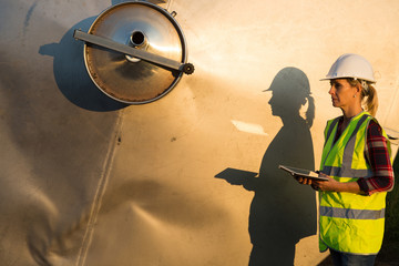 female engineer in contemporary winemaker factory