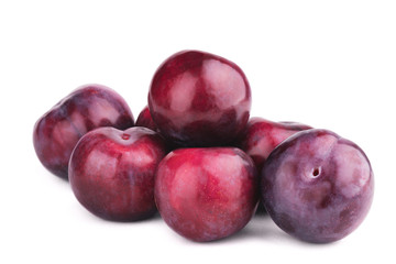 Obraz premium Group of plum fruits on white background