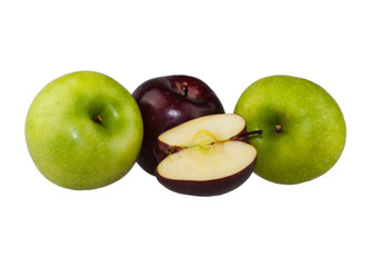 Green and red apple and a half close-up view on white background, isolated