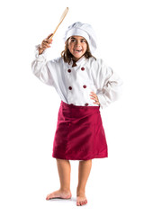 Little girl dressed like a chef