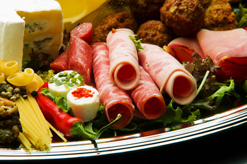 Composition with variety of grocery products including vegetables, fruits, meat, dairy and wine