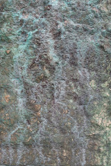 Copper green running on natural marble