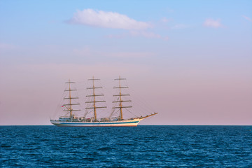 Fototapeta na wymiar Sailing Ship without Sails in the Sea
