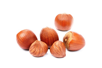 Group healty hazelnuts isolated on white background