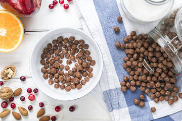 tasty breakfast with fruits and chocolate balls