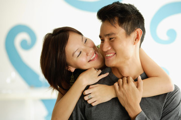 Fototapeta premium Woman with arm around man