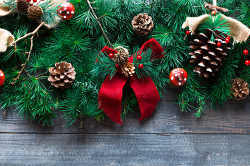 Merry Christmas Frame with real wood green pine, colorful baubles