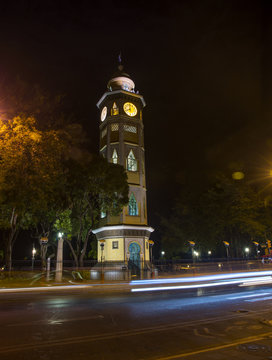 Clock tower in downtown Guayaquil, on the boardwalk, at night.