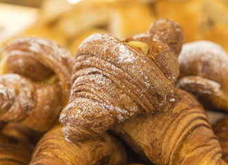 a number of tasty butter croissants on buffet line 