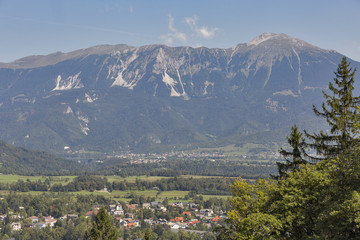 Fototapeta na wymiar Bled with The Karawanks mountain range in Slovenia