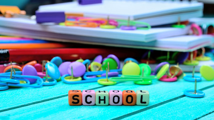 color cube word school on table