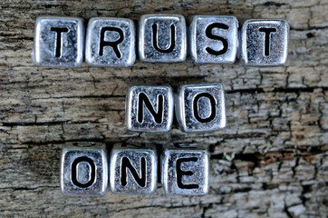 cube word trust no one on table