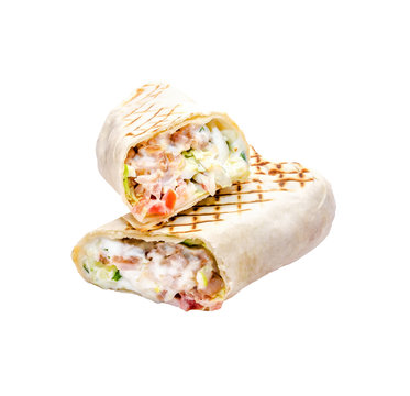 Tasty pita sandwich with lettuce, cheese, chicken fillet, fresh vegetables, mayonnaise, spices on a white background, isolated. Homemade wrap, street food concept.