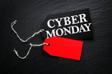 Cyber Monday Sale tags on dark background