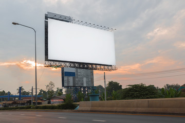 Blank white billboard and sunset at evening - can advertisement for display business or product.