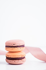 French macarons with chocolate ganache in pastel colors